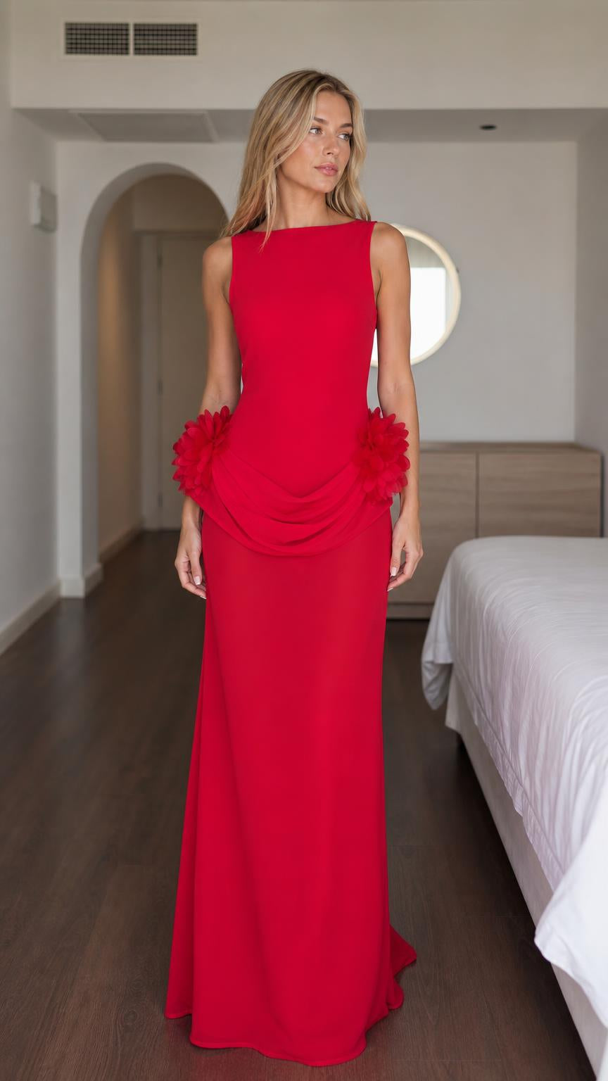 Front view of woman wearing red 3D flower accent maxi dress