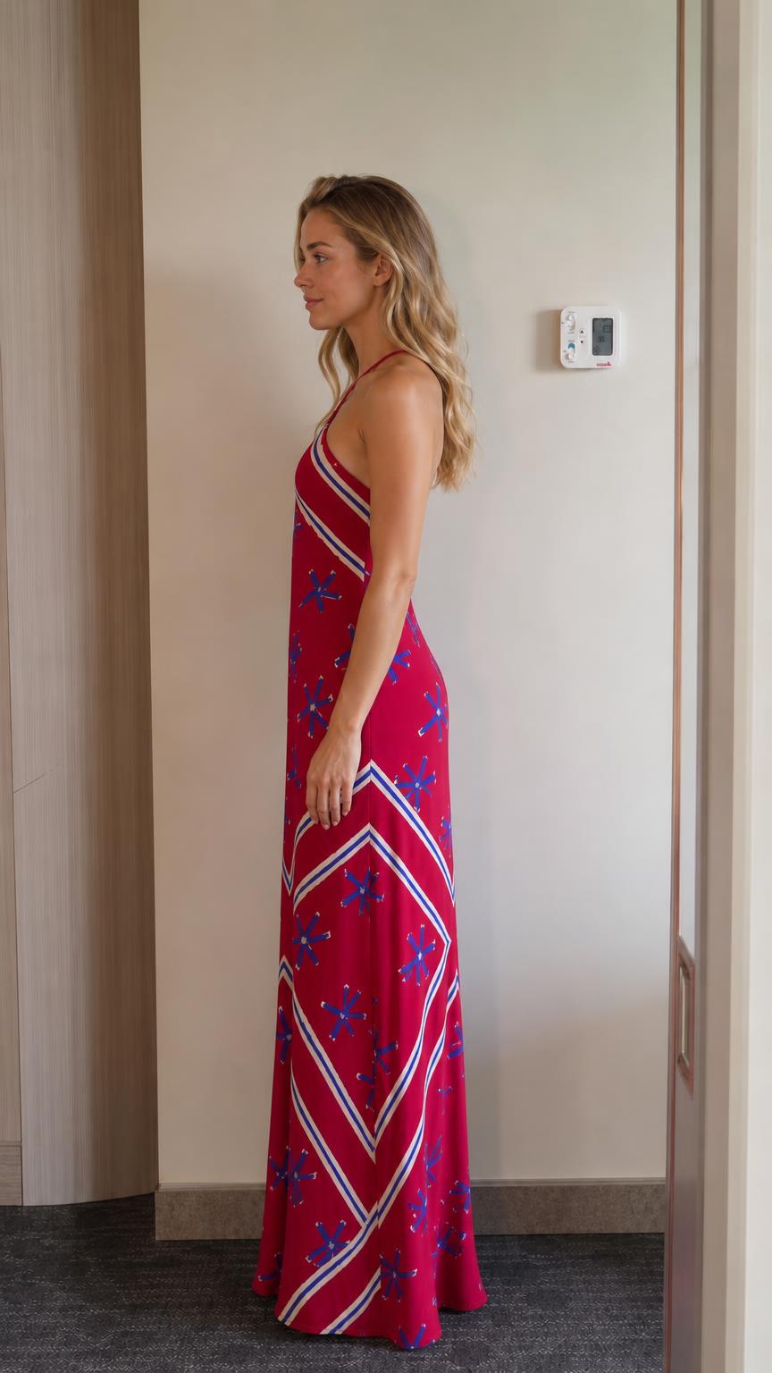 Side profile view of red maxi dress
