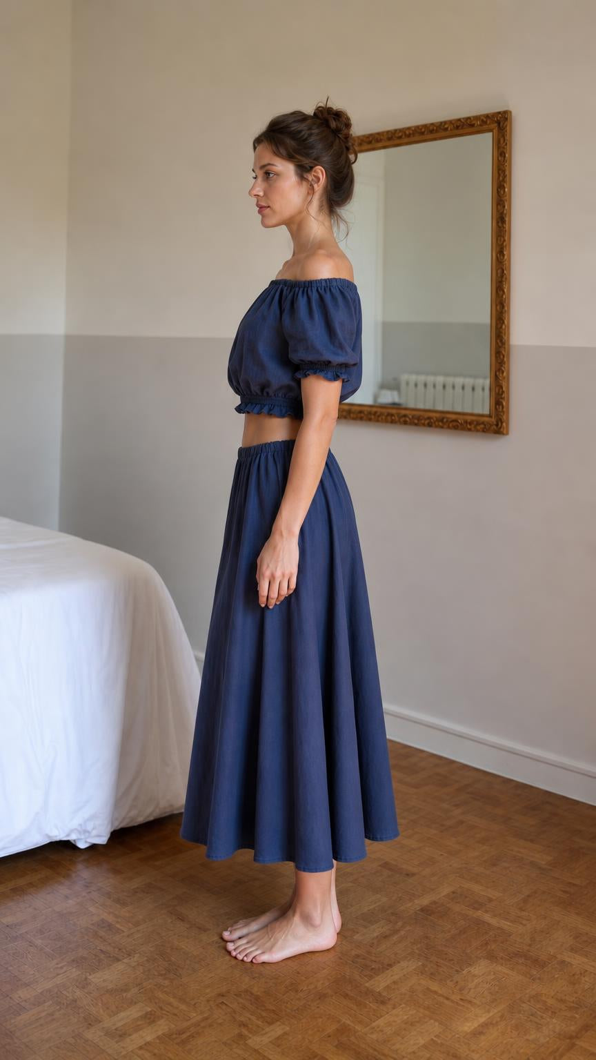 Side view of woman wearing blue two-piece set