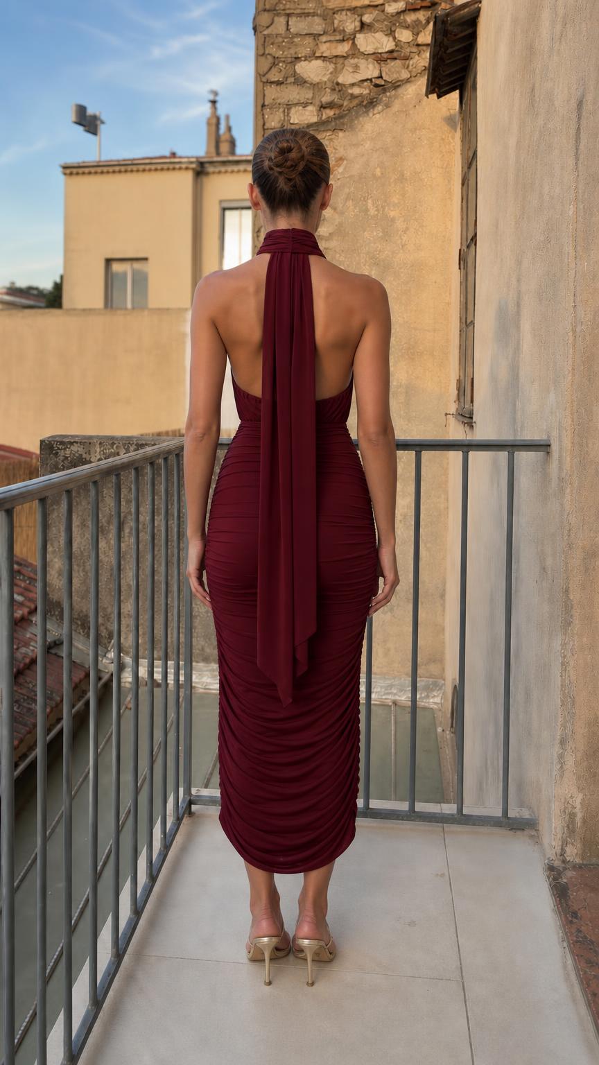 Back view showcasing halter neck scarf tie on burgundy midi dress