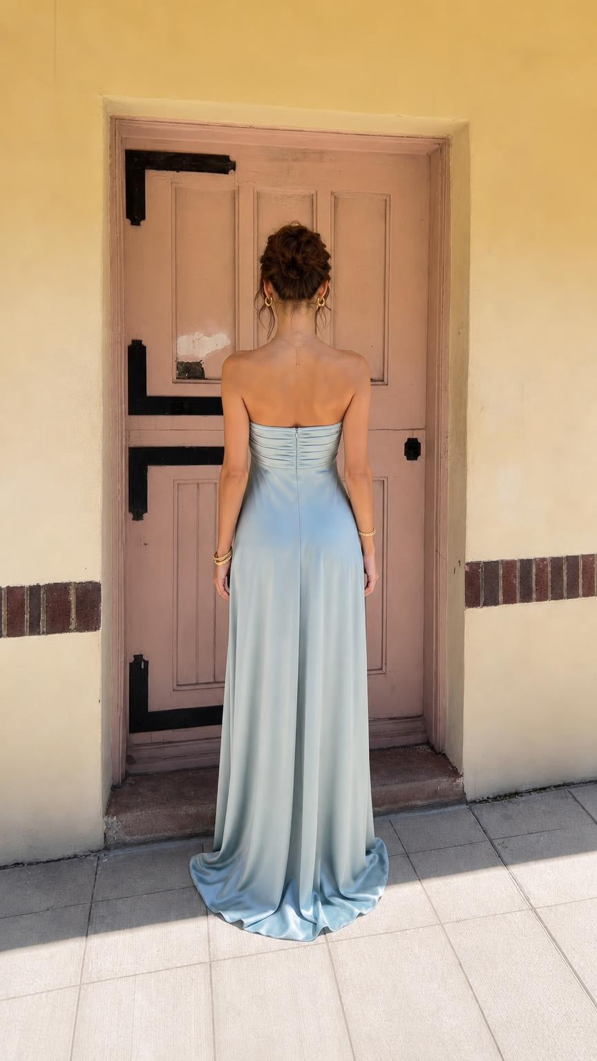 Sage green formal dress back view with subtle train