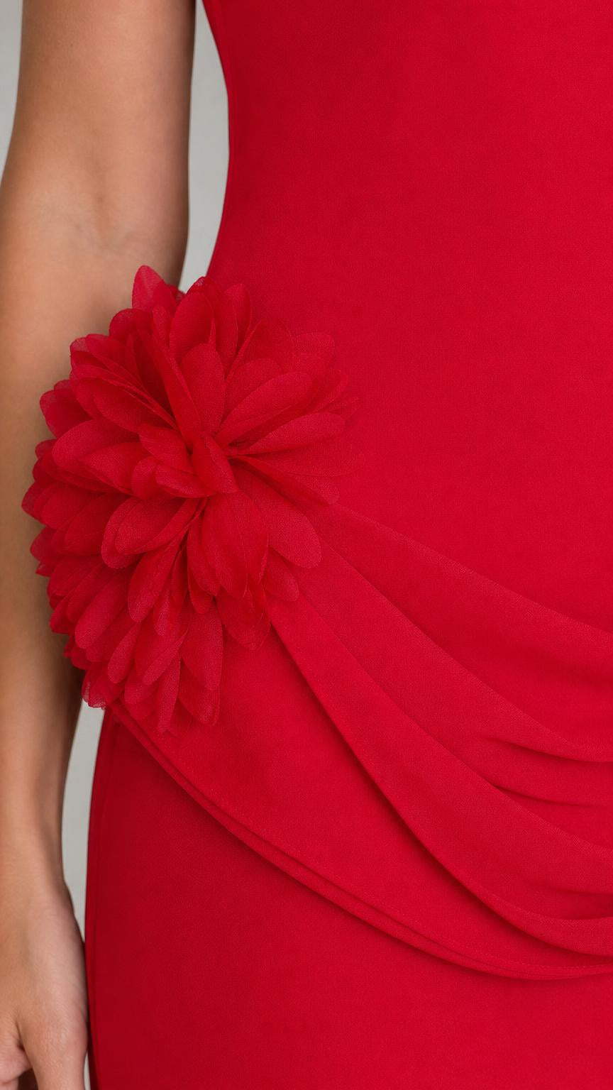 Close-up detail of red 3D fabric flower hip appliqué